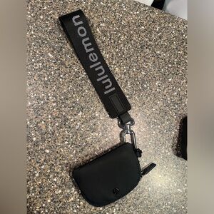Lululemon keychain with card holder gently worn.
